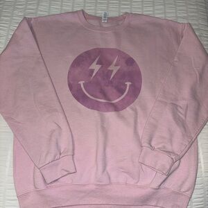 pink smiley graphic crewneck